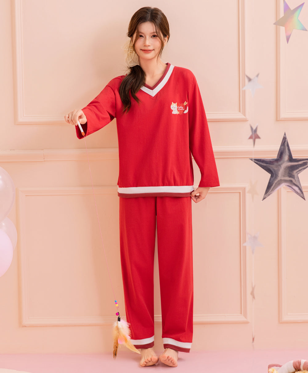 Person wearing a red pajama set