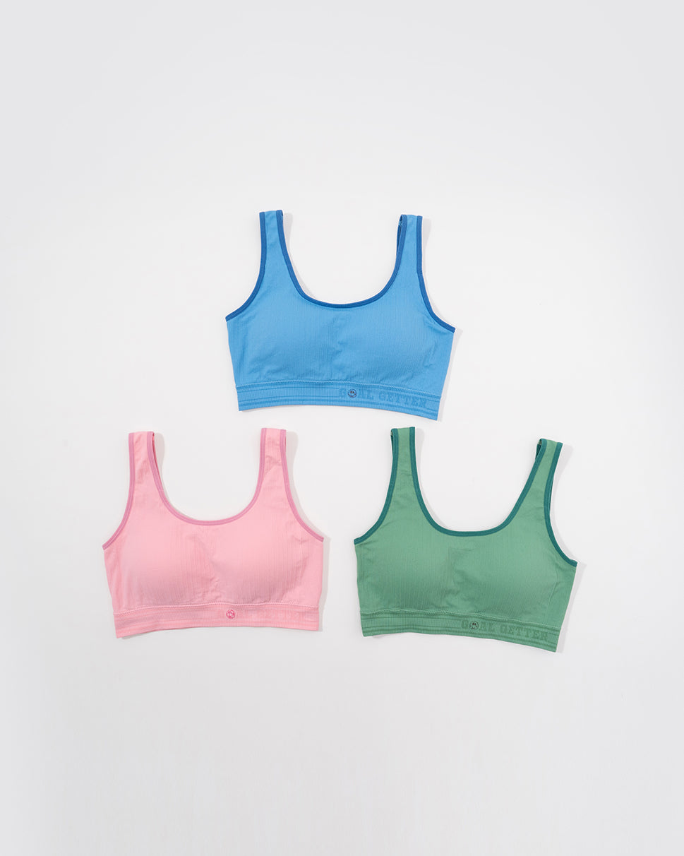 Three colorful sports bras