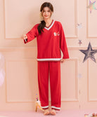 Person wearing a red pajama set 